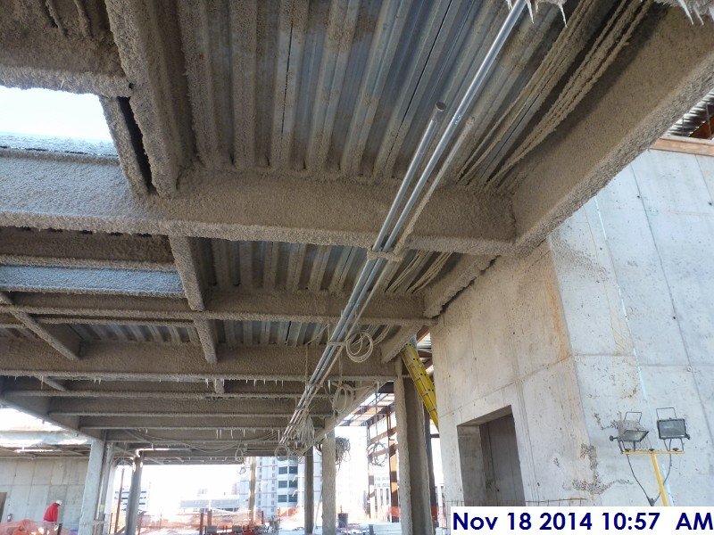 Started installing conduit above the ceiling at the 4th floor Facing East